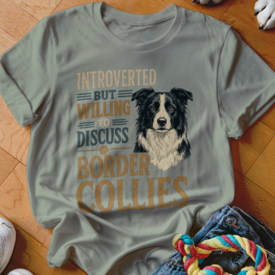 Light blue t-shirt with a border collie and text "Introverted but willing to discuss border collies".