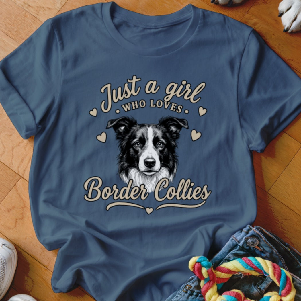 A blue t-shirt with a graphic of a Border Collie and the text Just a girl who loves Border Collies.