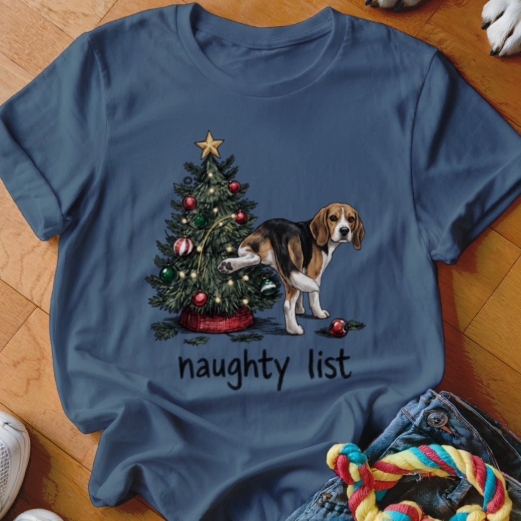 Beagle near Christmas tree with text "naughty list"