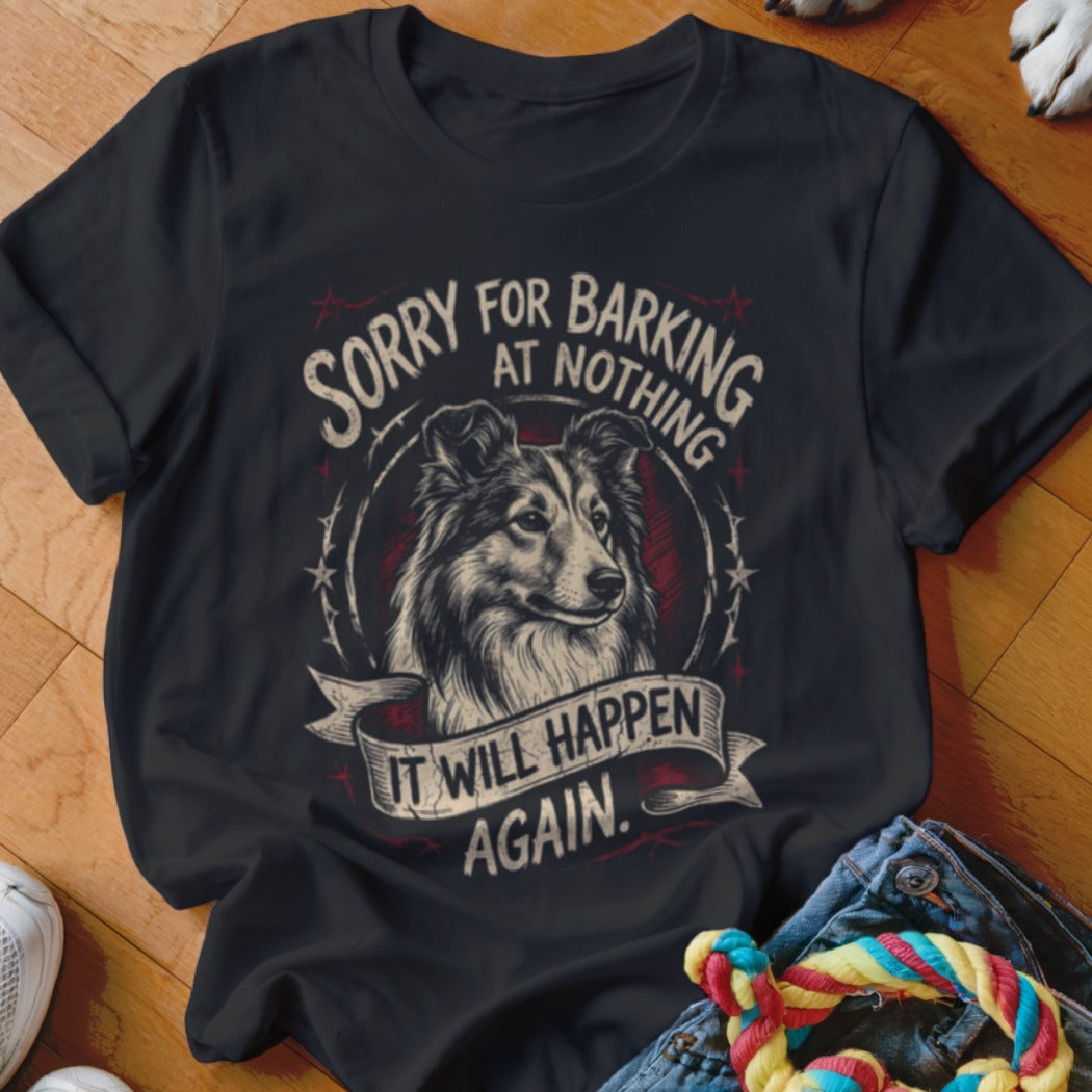 A black t-shirt printed with a Collie graphic and the text Sorry for barking at nothing. It will happen again.