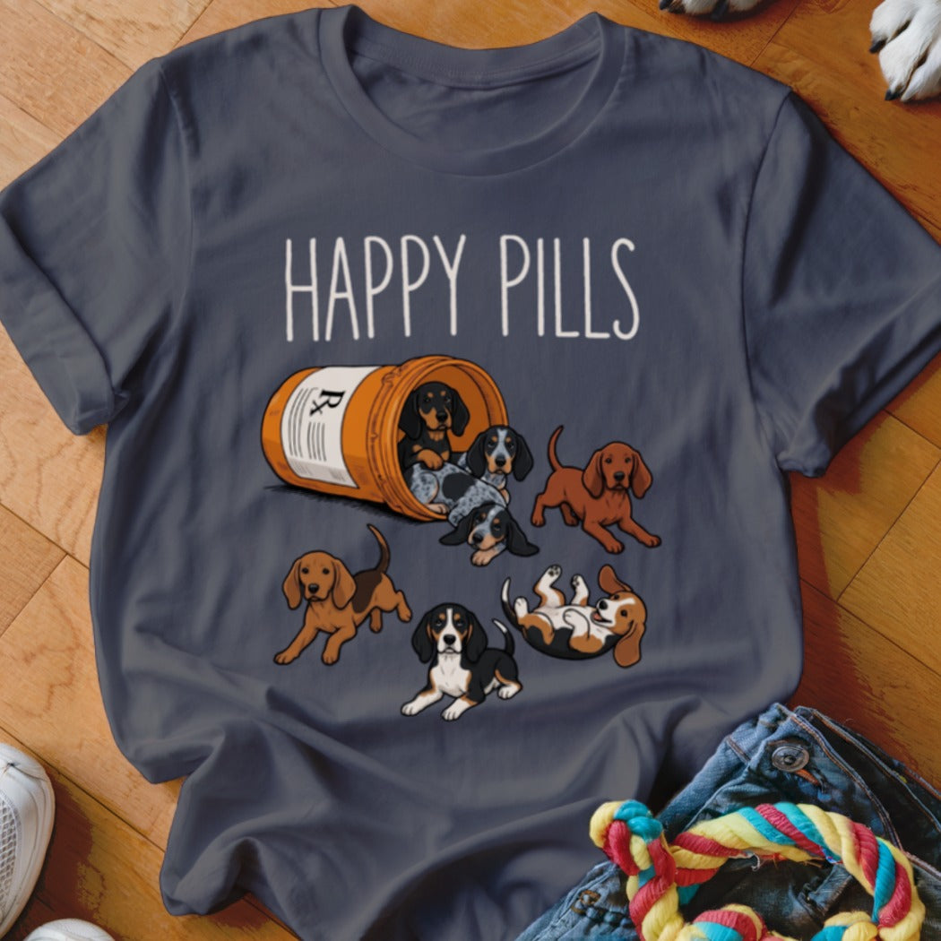 T-shirt with "Happy Pills" text and cartoon dogs spilling from a pill bottle.