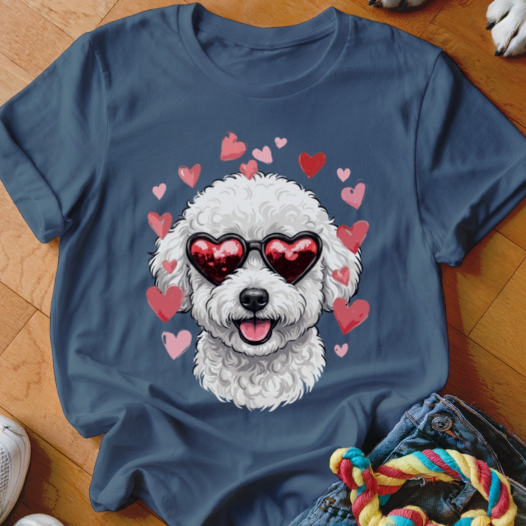 Dark blue t-shirt featuring a graphic of a white fluffy dog wearing heart-shaped sunglasses surrounded by pink hearts.