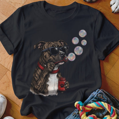 A black t-shirt features a graphic of a brindle dog wearing sunglasses and blowing soap bubbles.