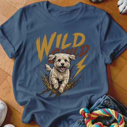 Blue t-shirt featuring a graphic of a playful dog running through mud with the text WILD CHILD.