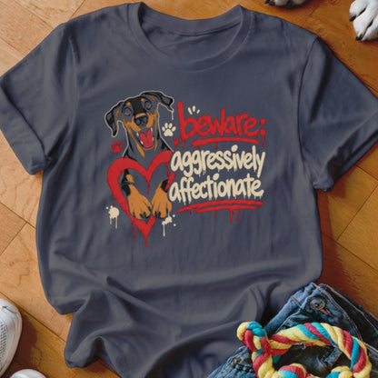 T-shirt graphic: Doberman dog inside a heart, text "Beware: aggressively affectionate".