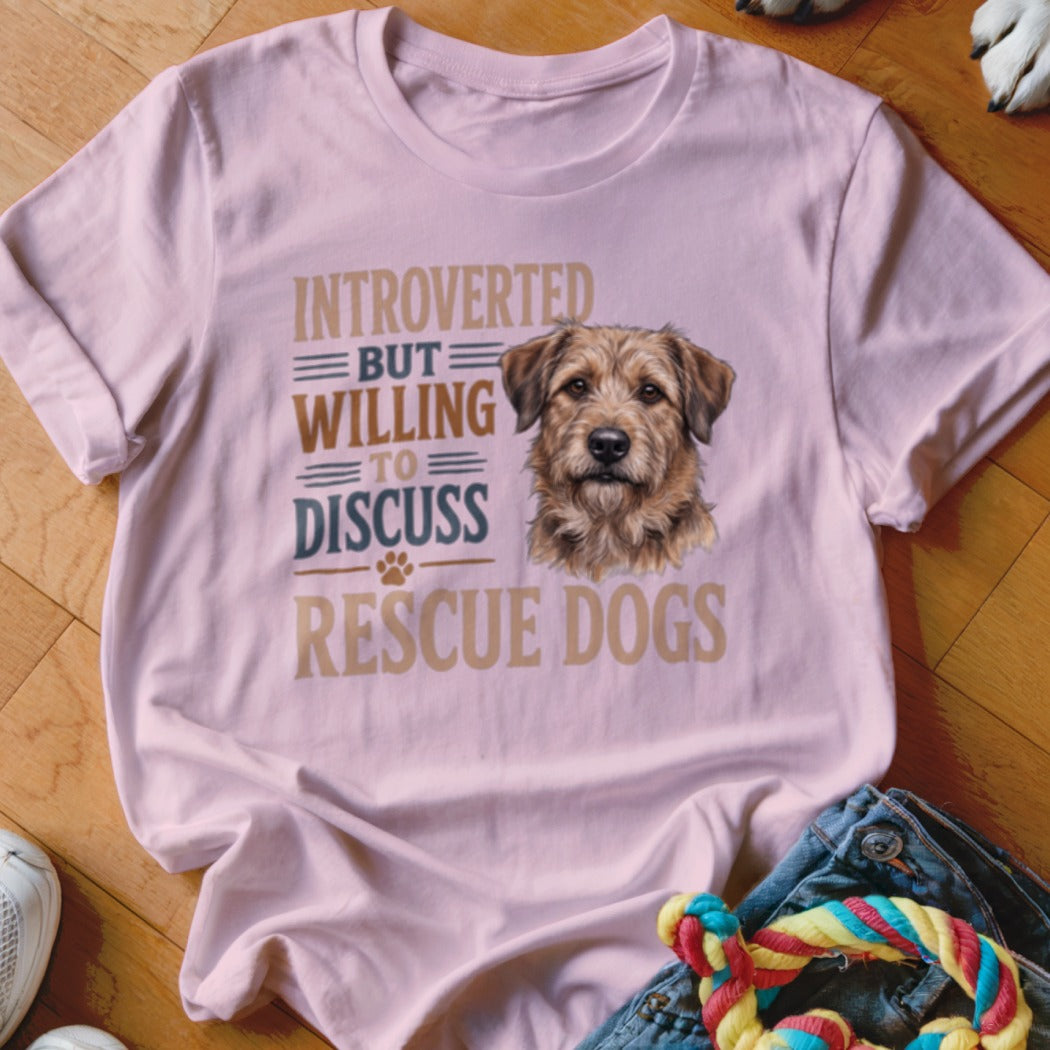 Pink t-shirt with "Introverted but willing to discuss rescue dogs" text and dog portrait.