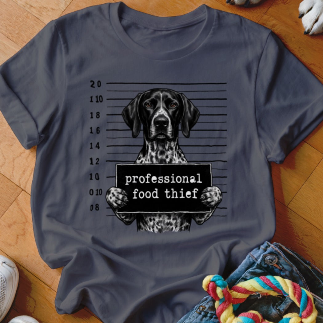 German Shorthaired Pointer mugshot with "professional food thief" sign.