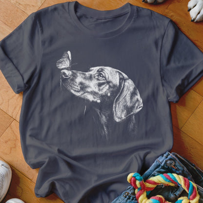 Dark gray crewneck t-shirt featuring a white sketch graphic of a dog looking at a butterfly.