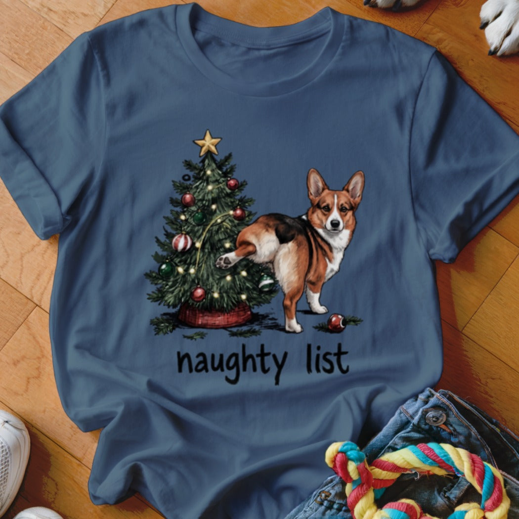 Corgi by Christmas tree with text "naughty list"