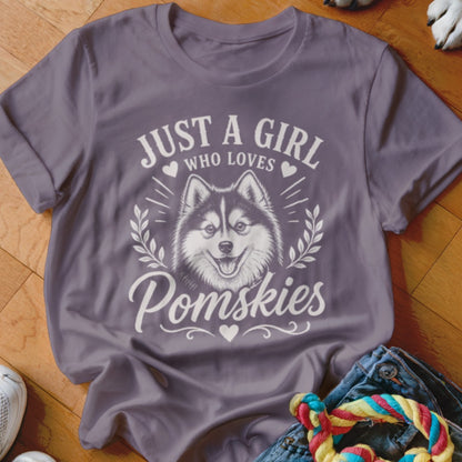Purple t-shirt with "Just a girl who loves Pomskies" and a Pomsky dog illustration.