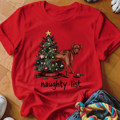 Red t-shirt with Christmas tree, dog, and "naughty list" text.