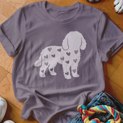 Gray t-shirt with a white doodle dog silhouette filled with small hearts.