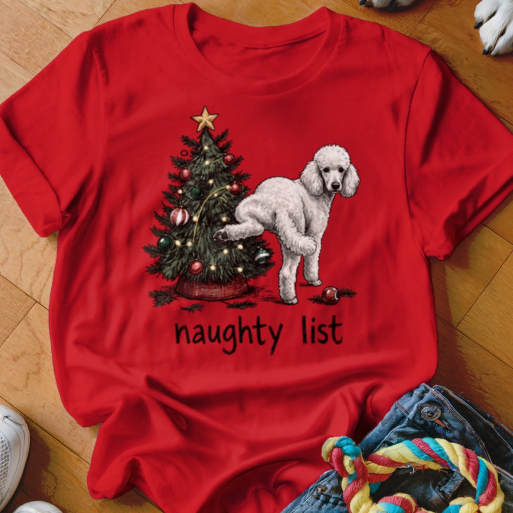 Red t-shirt with Christmas tree and white poodle peeing, reads "naughty list".
