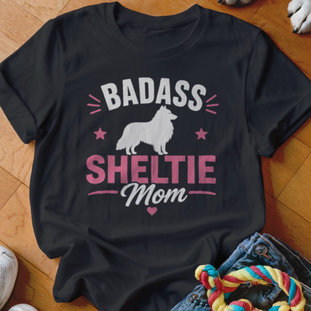 Black t-shirt with "Badass Sheltie Mom" text and a white Sheltie silhouette.