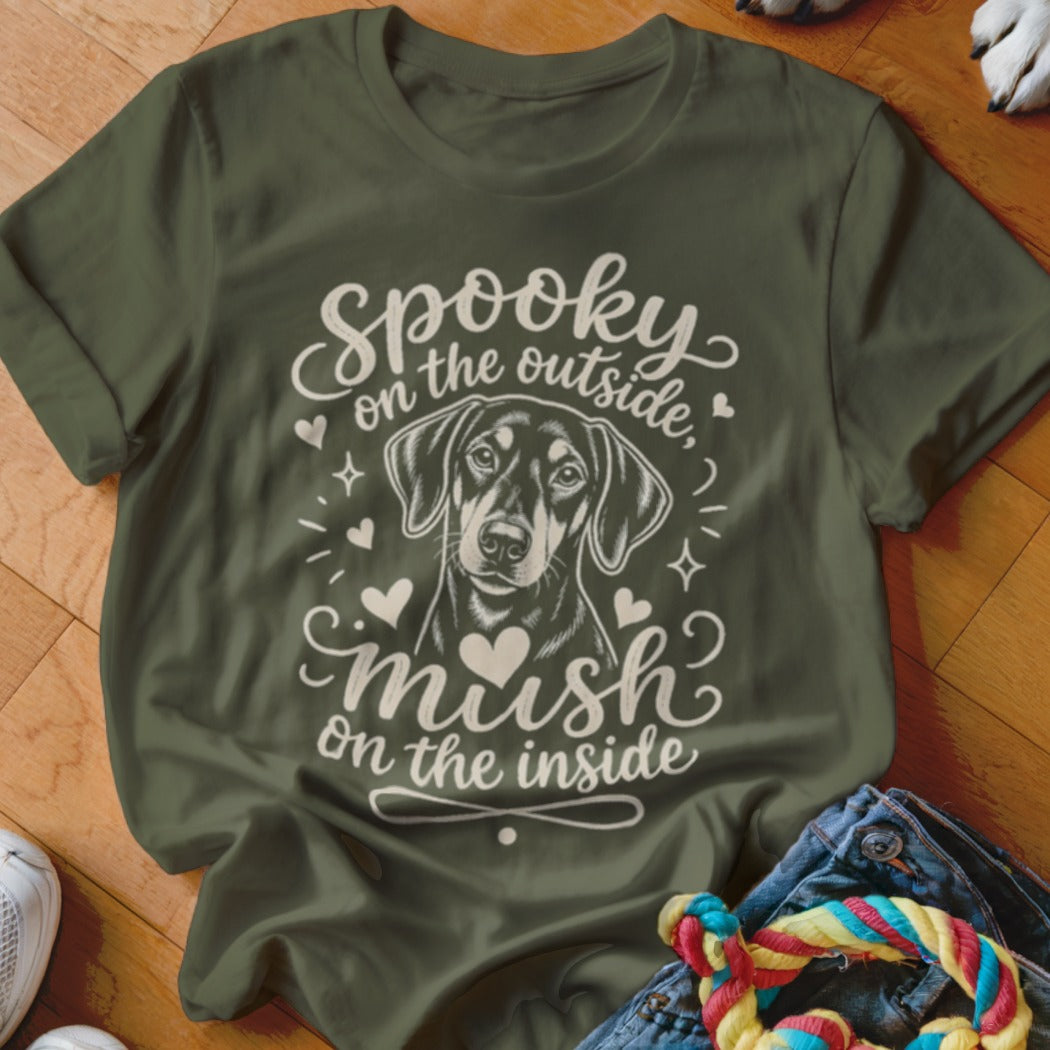 Green t-shirt with dog and "Spooky on the outside, mush on the inside" text