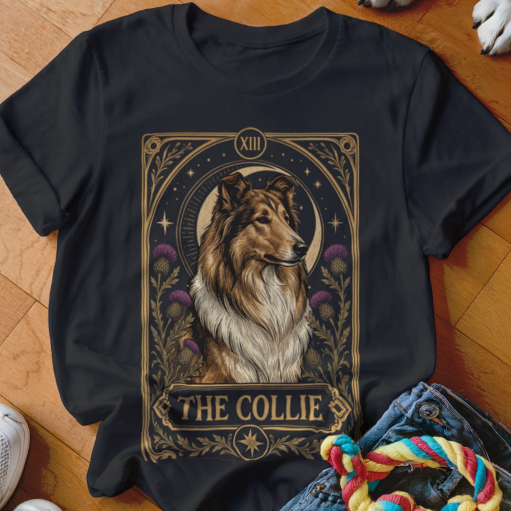 A black t-shirt features a tarot-style graphic of a collie dog surrounded by thistles and the text The Collie.