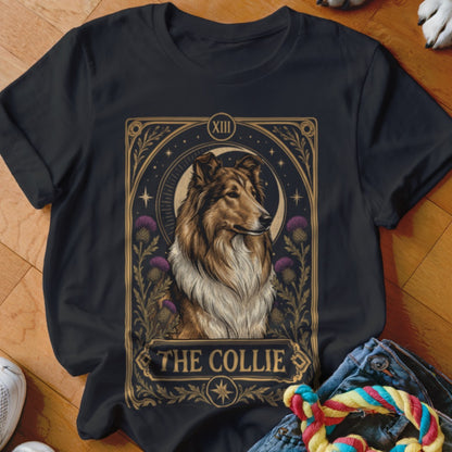 A black t-shirt features a tarot-style graphic of a collie dog surrounded by thistles and the text The Collie.