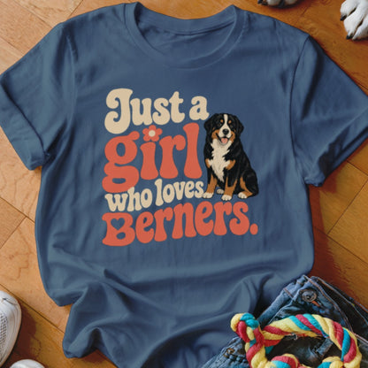 Blue t-shirt with "Just a girl who loves Berners" text and Bernese Mountain Dog illustration.