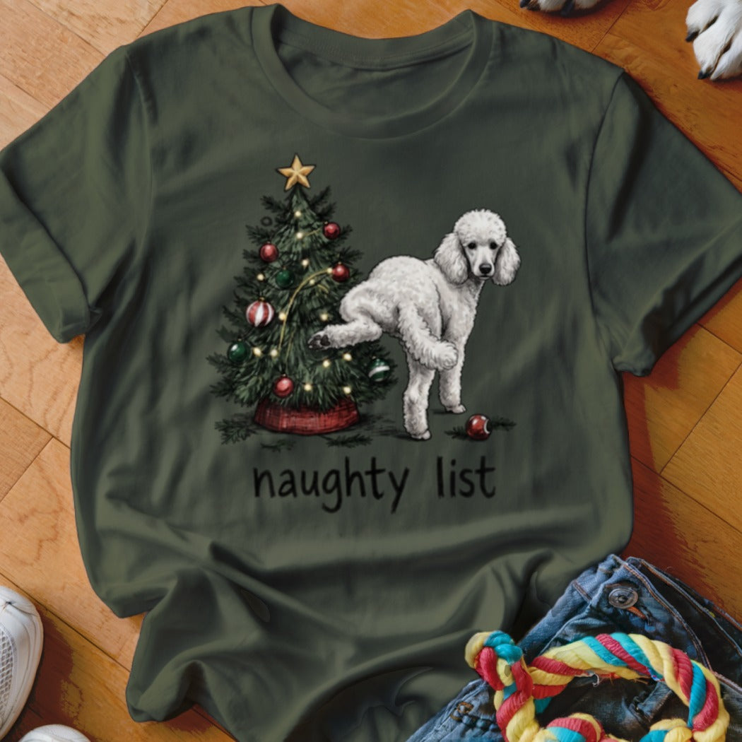 White poodle next to Christmas tree, text "naughty list"