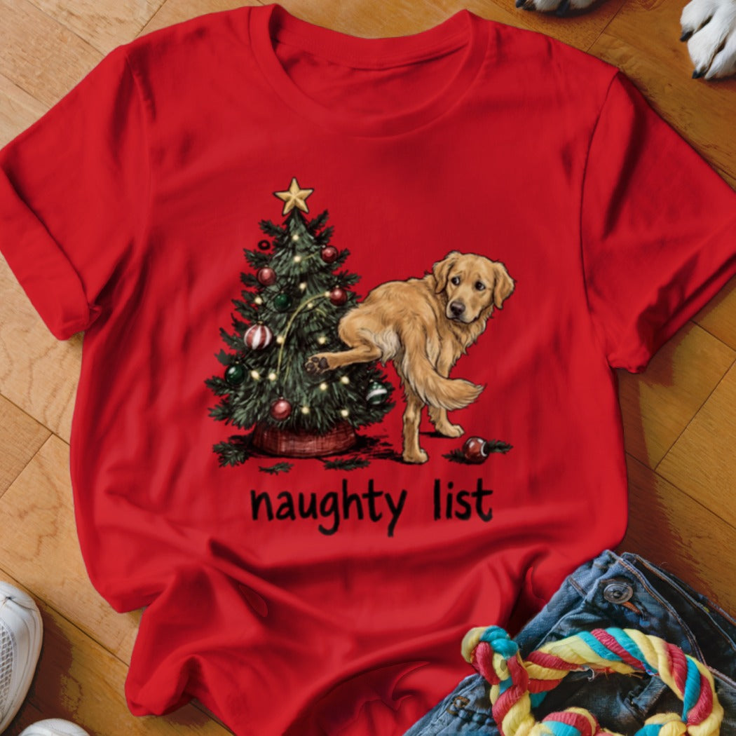 Red t-shirt with a Golden Retriever near a Christmas tree, text "naughty list".