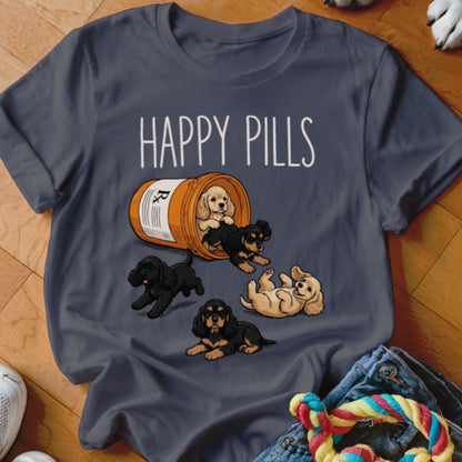 T-shirt with text "HAPPY PILLS" and cartoon puppies spilling from a pill bottle.