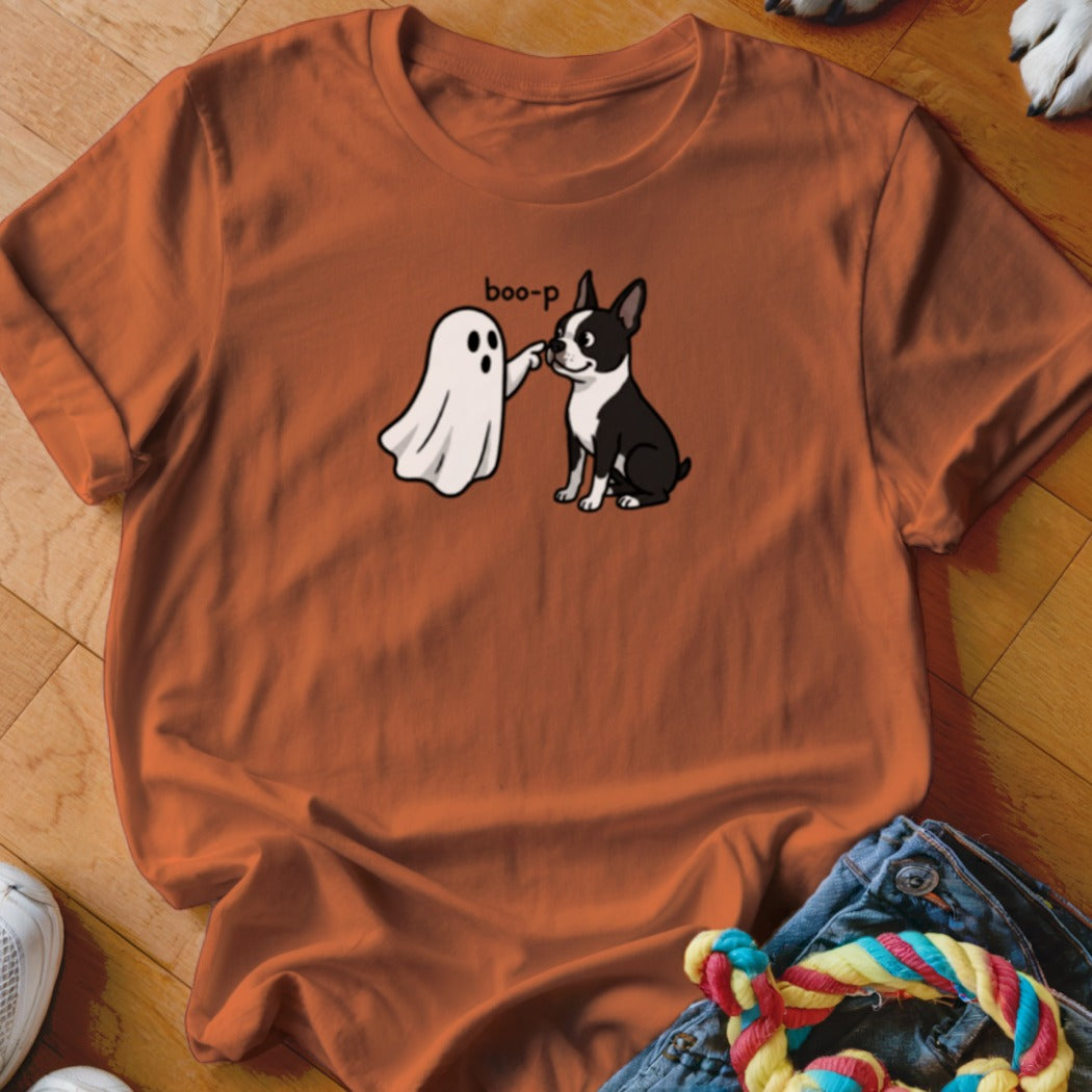 Ghost booping Boston Terrier with text "boo-p" on orange t-shirt.