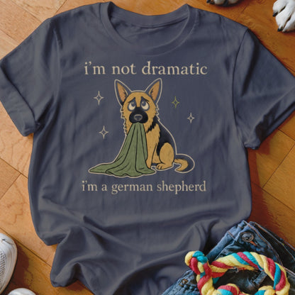 German Shepherd with green blanket in mouth and text "I'm not dramatic I'm a German Shepherd".