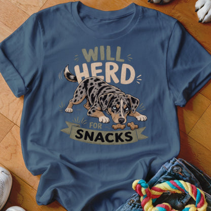 Blue t-shirt with catahoula hound and text "will herd for snacks".