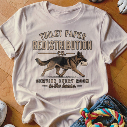 German Shepherd carrying toilet paper on t-shirt with text "Toilet Paper Redistribution Co."