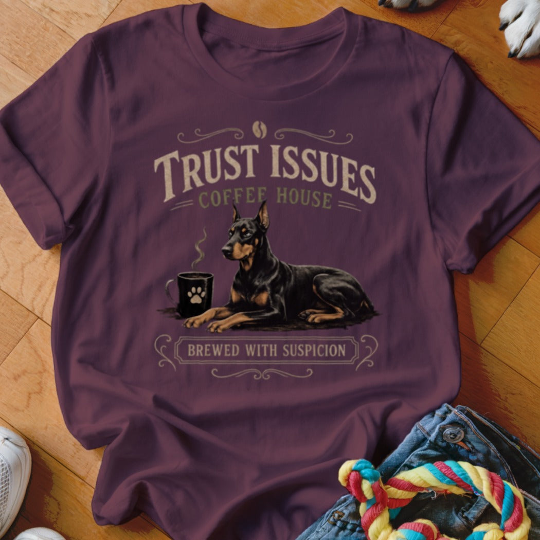 Maroon t-shirt with a Doberman Pinscher next to a coffee cup, "Trust Issues Coffee House" text.