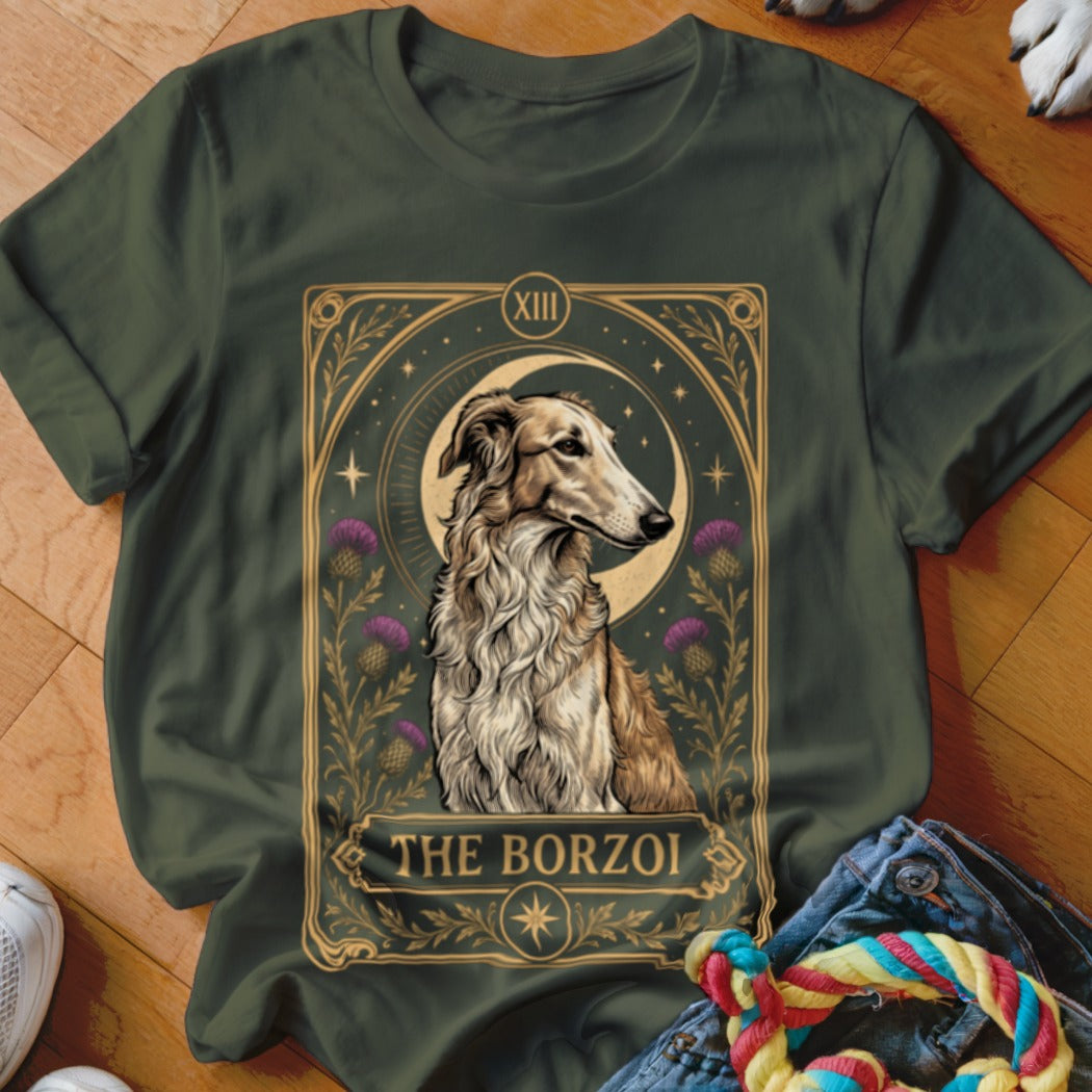 Olive green t-shirt featuring a tarot-style graphic of a borzoi dog, moon, and thistle flowers.