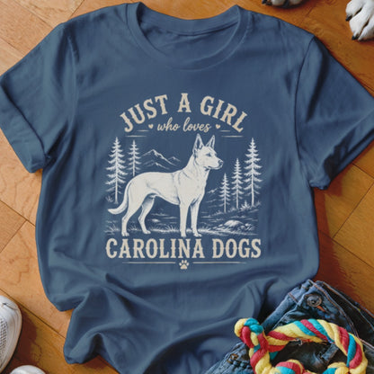 Blue t-shirt with white graphic of a Carolina Dog and text "Just a girl who loves Carolina dogs".