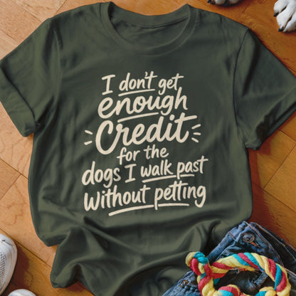 Dark green t-shirt with white text: "I don't get enough credit for the dogs I walk past without petting."