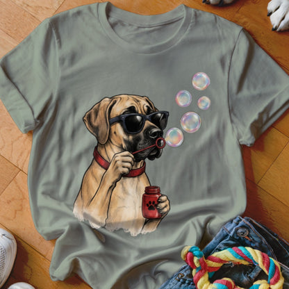 Sage green t-shirt featuring a graphic of a mastiff wearing sunglasses and blowing soap bubbles.