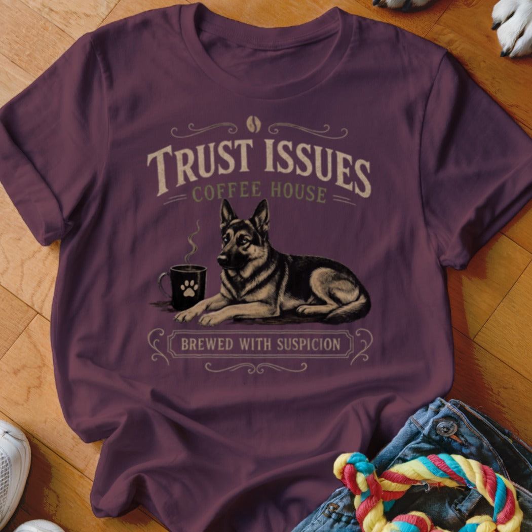 German Shepherd with coffee mug, "Trust Issues Coffee House" and "Brewed With Suspicion" text.