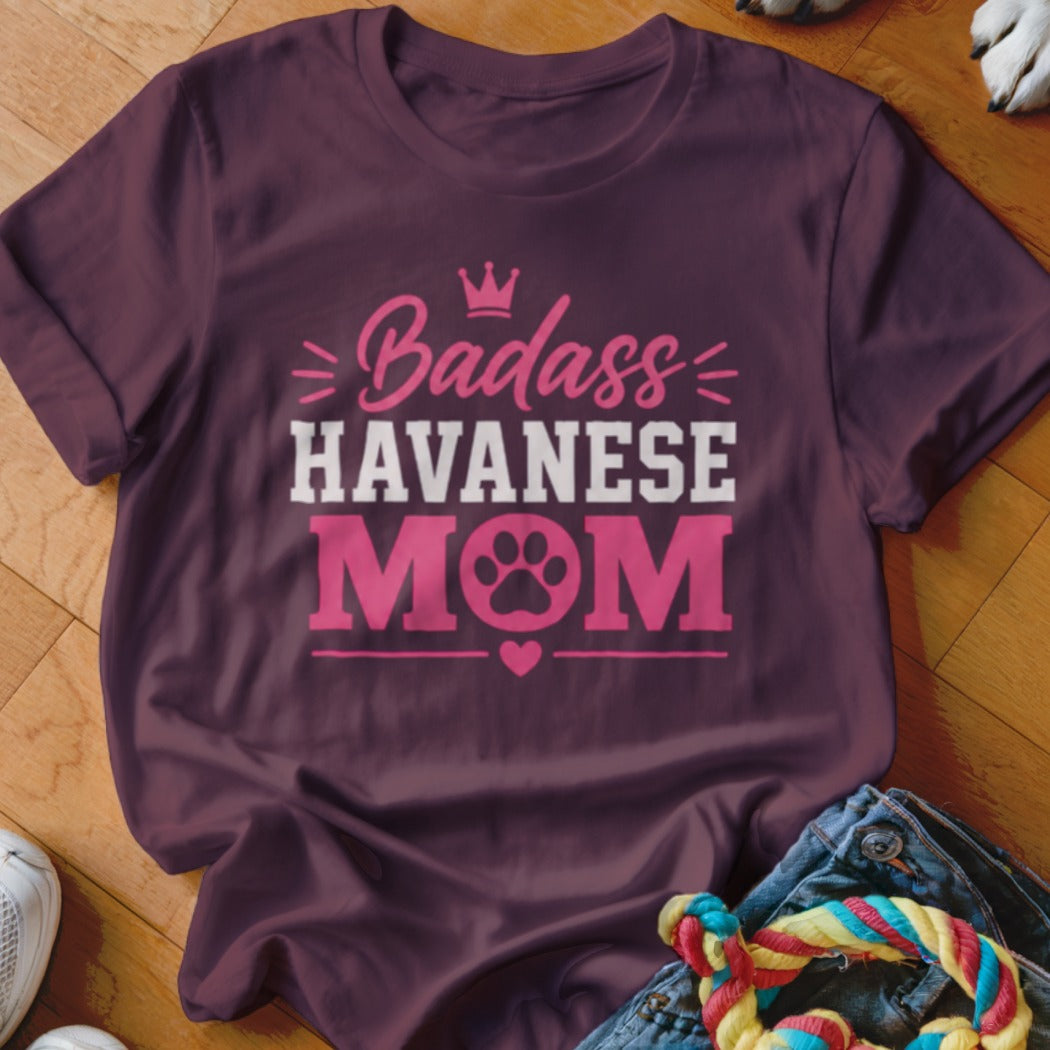 Burgundy t-shirt with "Badass Havanese Mom" graphic and paw print.
