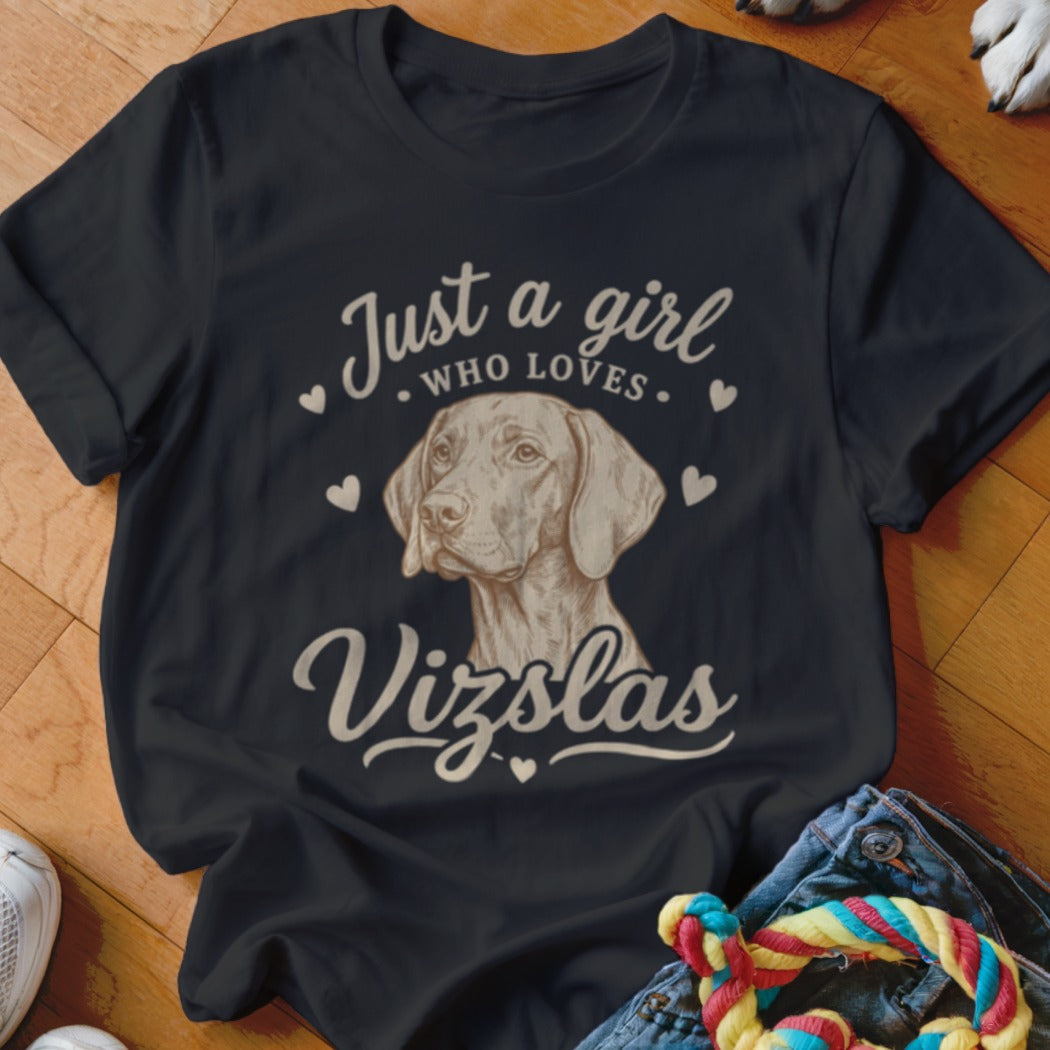 A black t-shirt printed with a Vizsla dog sketch and the text Just a girl who loves Vizslas.