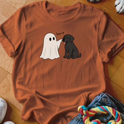 Ghost gently booping a black lab with text "boo-p" on orange t-shirt.