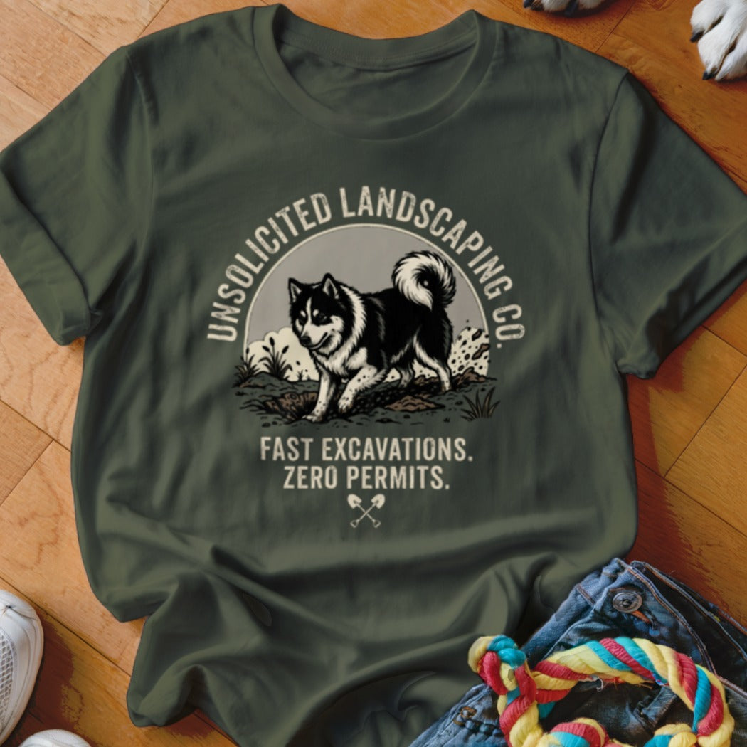 Green t-shirt with Unsolicited Landscaping Co. text, husky, and crossed shovels.