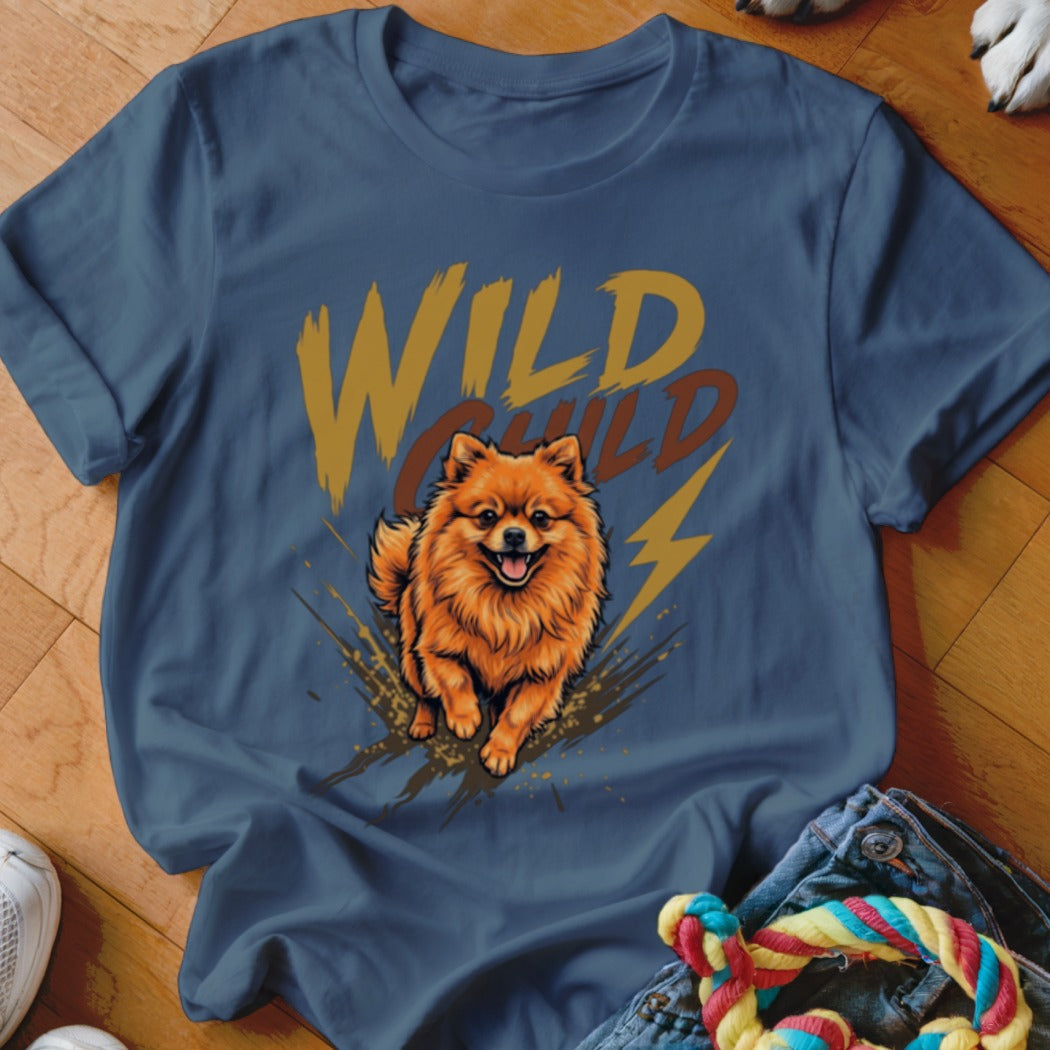 Blue crewneck t-shirt featuring a graphic of an orange Pomeranian dog and the text Wild Child.