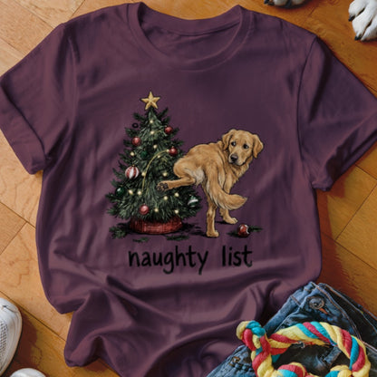 Golden retriever next to Christmas tree with text "naughty list".