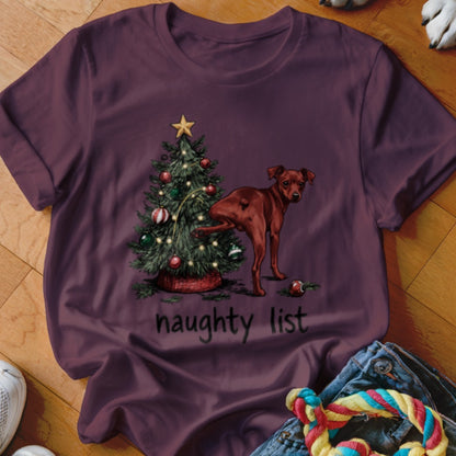 Brown dog peeing on a Christmas tree, with "naughty list" text.