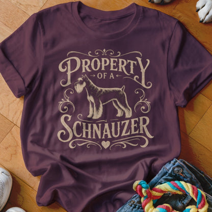 Maroon t-shirt with "PROPERTY OF A SCHNAUZER" text and a schnauzer dog graphic.