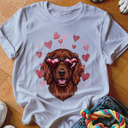 White crewneck t-shirt featuring a graphic of a brown dog wearing heart-shaped sunglasses surrounded by pink hearts.
