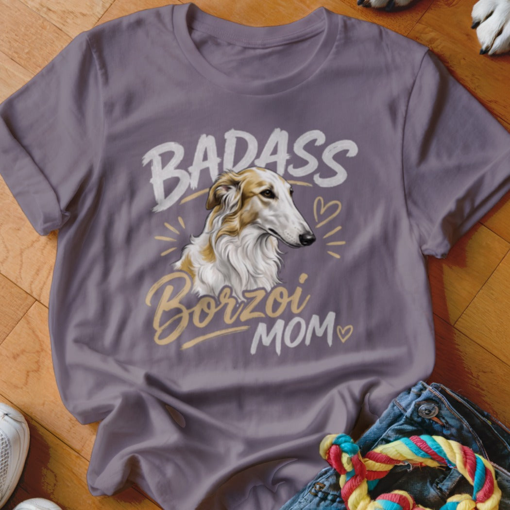 A grey t-shirt featuring an illustration of a Borzoi dog and the text Badass Borzoi Mom.