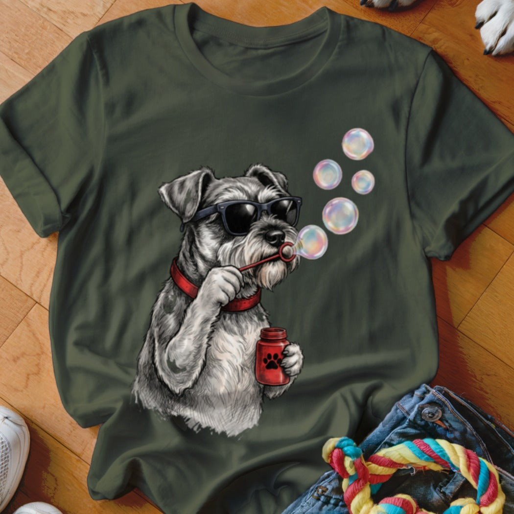 Dark green t-shirt featuring a graphic of a Schnauzer wearing sunglasses and blowing soap bubbles.