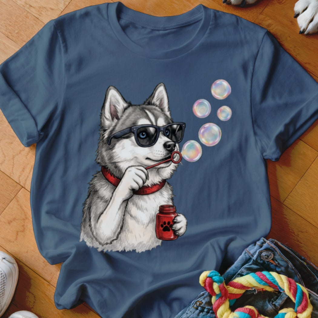 Dark blue t-shirt featuring an illustrated husky wearing sunglasses and blowing soap bubbles.