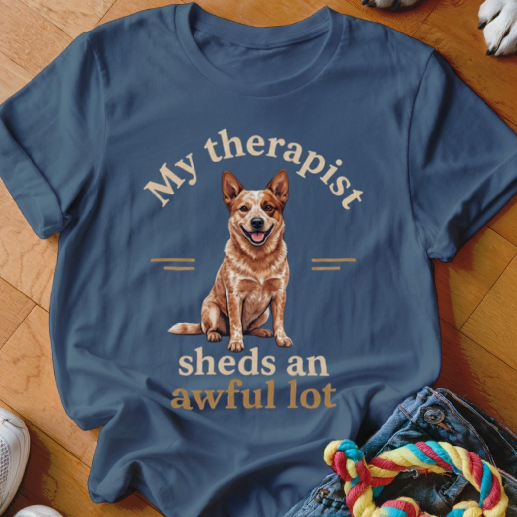 Blue t-shirt with a red heeler dog and text "My therapist sheds an awful lot".