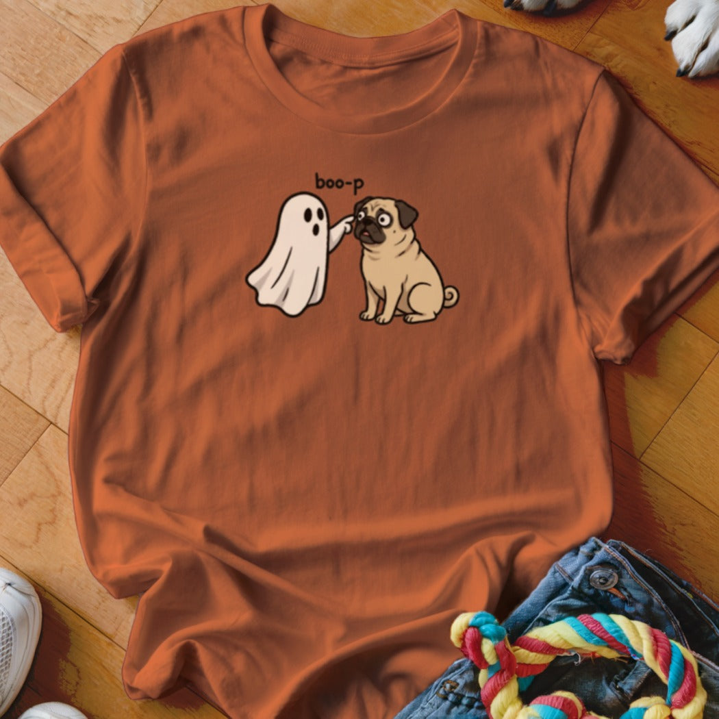 Orange t-shirt with a ghost poking a pug with "boo-p" text.