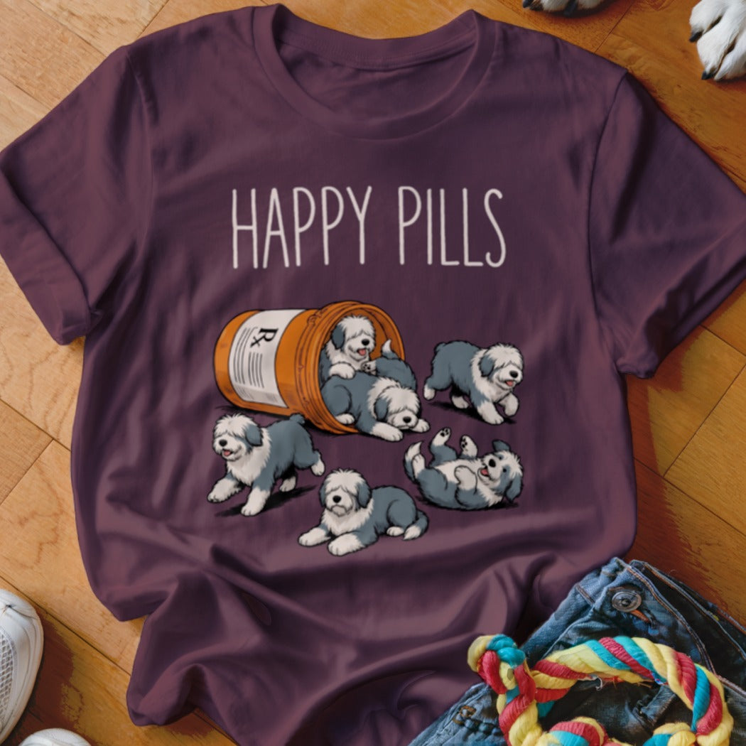 T-shirt with cartoon Old English Sheepdogs spilling from a pill bottle with "HAPPY PILLS" text.